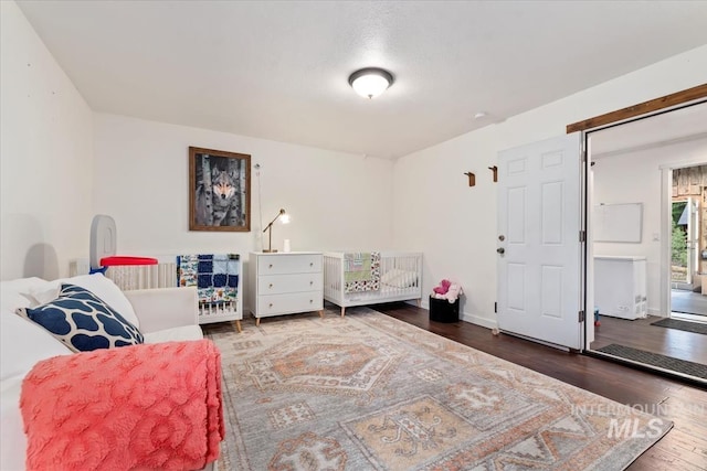 150 W Yuba Vista Dr, Atlanta, ID 83716 - bedroom featuring wood finished floors