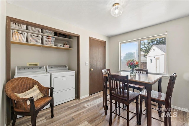 131 Goodall Pl, Mountain Home, ID 83647 - dining space with separate washer and dryer, light wood-type flooring, and baseboards