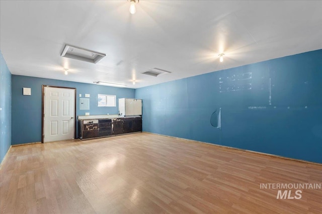 131 Goodall Pl, Mountain Home, ID 83647 - unfurnished room with attic access and light wood finished floors