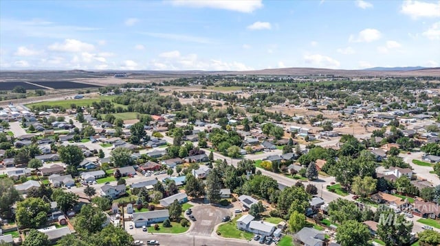 131 Goodall Pl, Mountain Home, ID 83647 - aerial perspective of suburban area with a mountain backdrop