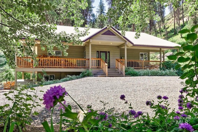 view of front of home with a wooden deck