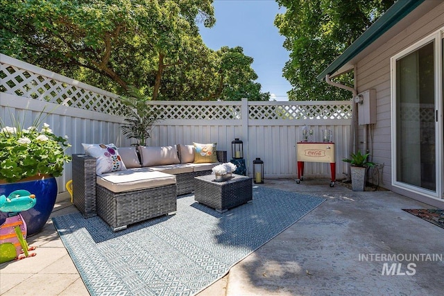 498 E Chester Ln, Boise, ID 83706 - fenced backyard featuring a patio and an outdoor living space