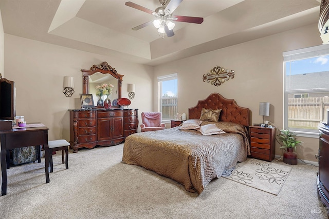 1020 Woodland St, Rupert, ID 83350 - bedroom featuring light carpet, multiple windows, and a ceiling fan