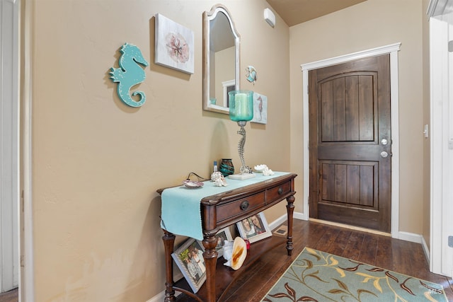 1020 Woodland St, Rupert, ID 83350 - foyer entrance featuring hardwood / wood-style floors and baseboards