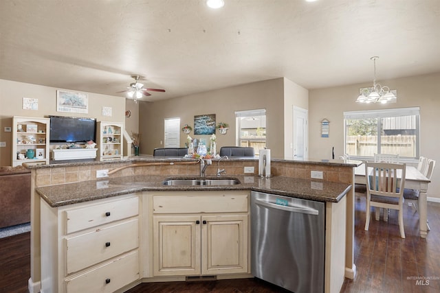 1020 Woodland St, Rupert, ID 83350 - kitchen featuring dishwasher, a sink, open floor plan, a ceiling fan, and dark wood finished floors