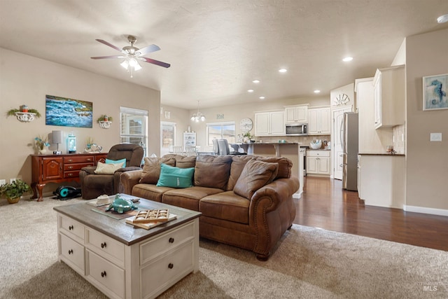 1020 Woodland St, Rupert, ID 83350 - living room featuring carpet floors, a ceiling fan, and recessed lighting