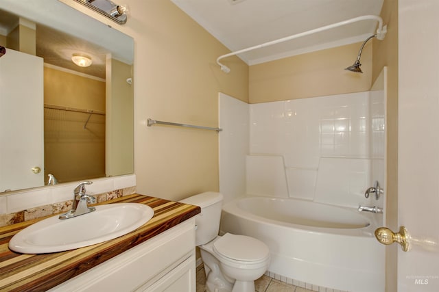 full bath with toilet, bathtub / shower combination, vanity, and tile patterned flooring