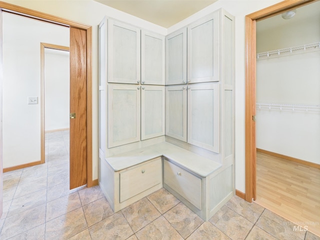 mudroom featuring baseboards