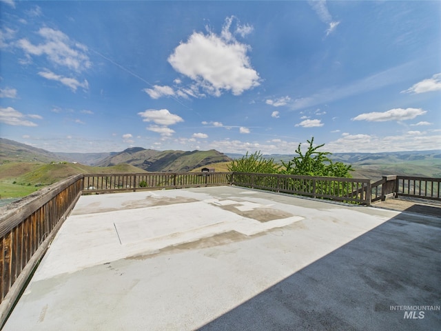 view of patio with a mountain view
