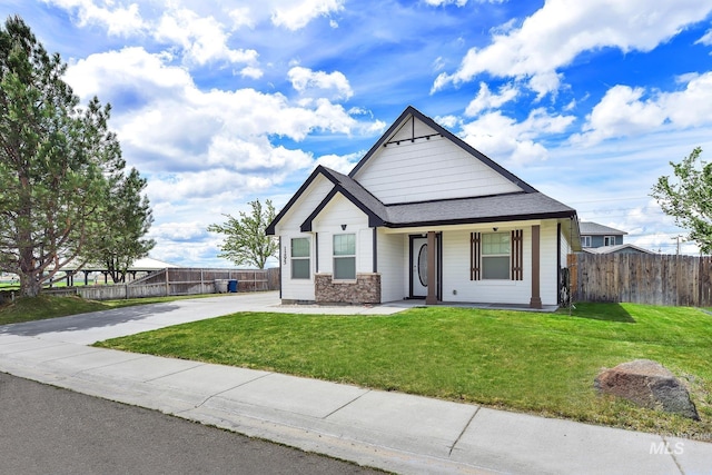 1295 NE Blossom, Mountain Home, ID 83647 - view of front of property featuring a porch and roof with shingles