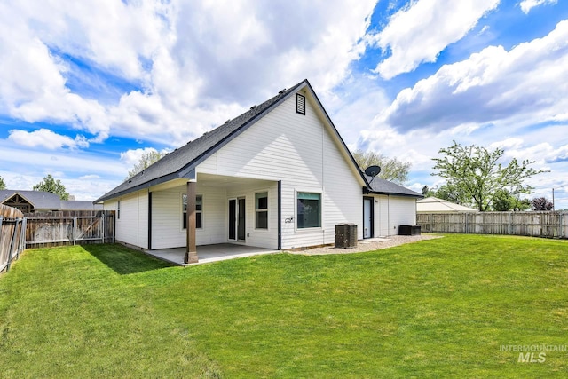 1295 NE Blossom, Mountain Home, ID 83647 - back of house featuring a patio area and central air condition unit