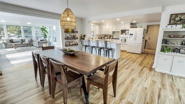 7985 S Cloverdale Rd, Boise, ID 83709 - dining space with recessed lighting and light wood-style flooring