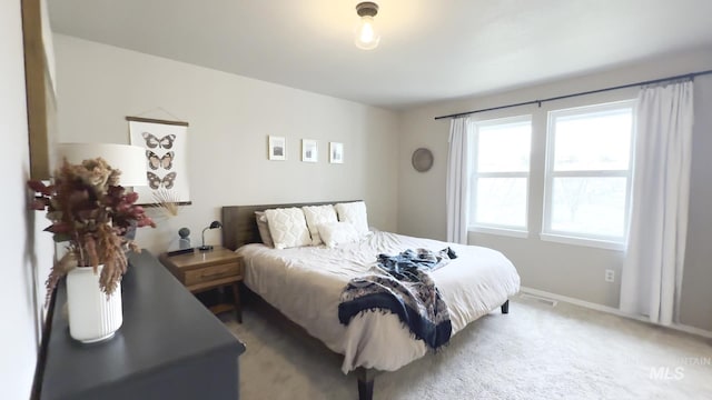 7985 S Cloverdale Rd, Boise, ID 83709 - bedroom with baseboards and light colored carpet
