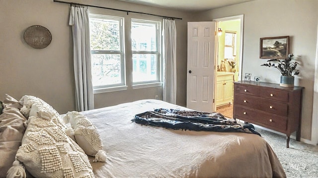 7985 S Cloverdale Rd, Boise, ID 83709 - bedroom featuring ensuite bath and light carpet