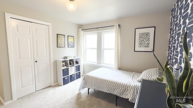 7985 S Cloverdale Rd, Boise, ID 83709 - carpeted bedroom featuring a closet and baseboards