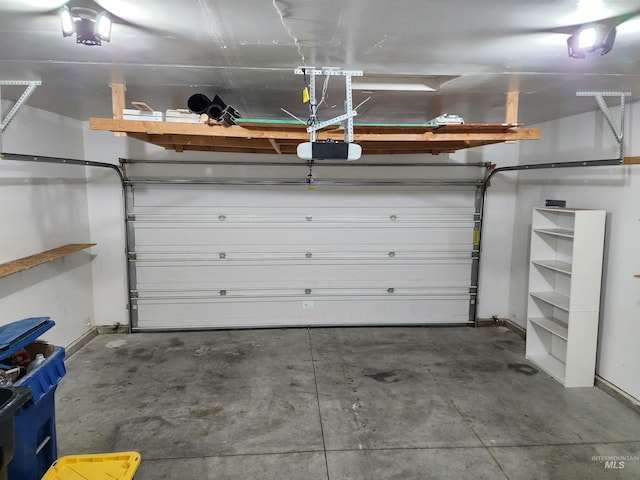 garage featuring a garage door opener