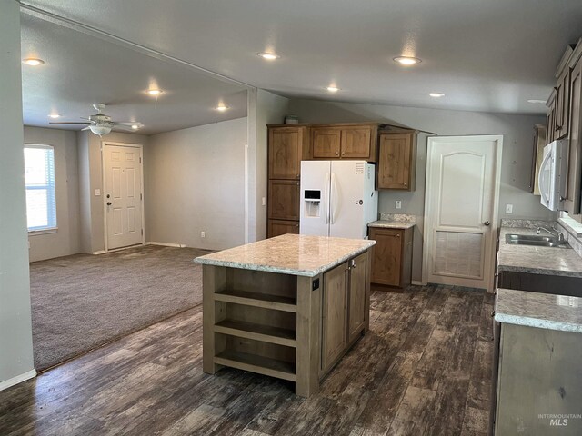 kitchen with open shelves, a kitchen island, white appliances, a sink, and dark wood finished floors