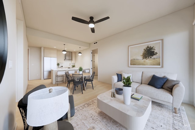 4340 E Haystack St Unit 204, Boise, ID 83716 - living area featuring a ceiling fan and light wood finished floors