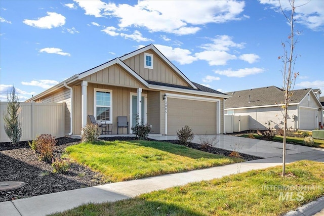 view of front of property featuring board and batten siding, a porch, an attached garage, and concrete driveway