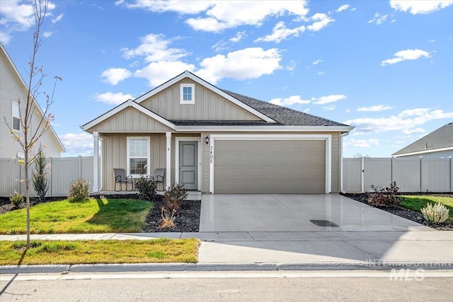 ranch-style house featuring an attached garage, a porch, concrete driveway, fence, and board and batten siding
