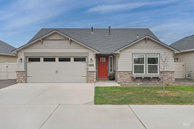 6296 W Mattawa Dr, Meridian, ID 83646 - craftsman inspired home with concrete driveway, roof with shingles, stone siding, a garage, and fence