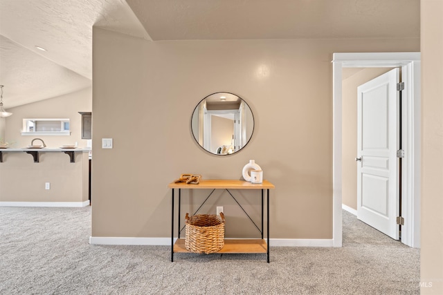 6296 W Mattawa Dr, Meridian, ID 83646 - hall featuring carpet floors, baseboards, and lofted ceiling