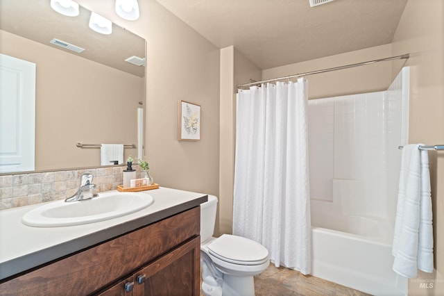 6296 W Mattawa Dr, Meridian, ID 83646 - bathroom with vanity, shower / bath combination with curtain, toilet, visible vents, and decorative backsplash