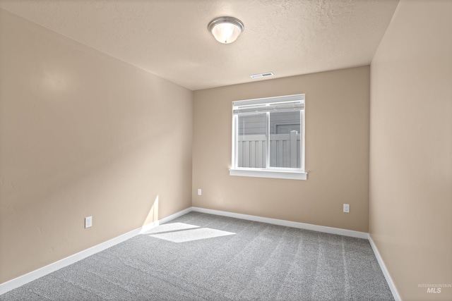 6296 W Mattawa Dr, Meridian, ID 83646 - carpeted spare room featuring visible vents, baseboards, and a textured ceiling