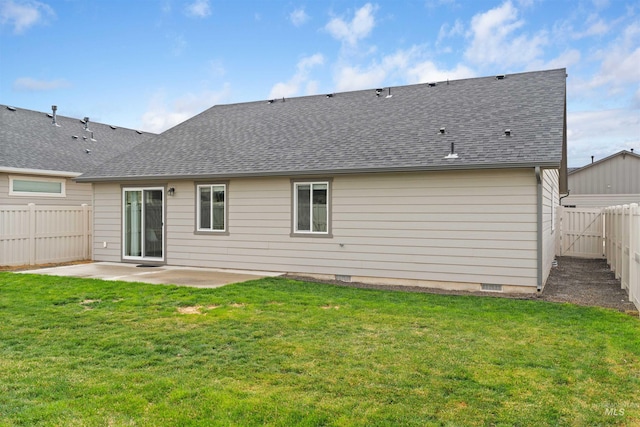 6296 W Mattawa Dr, Meridian, ID 83646 - rear view of property featuring a patio area, roof with shingles, a fenced backyard, and a lawn