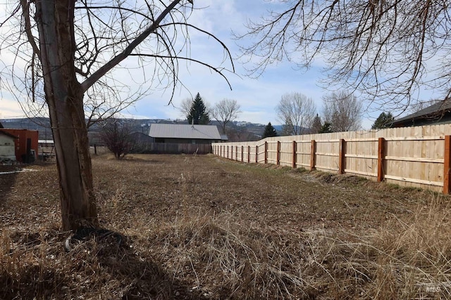 view of yard featuring fence