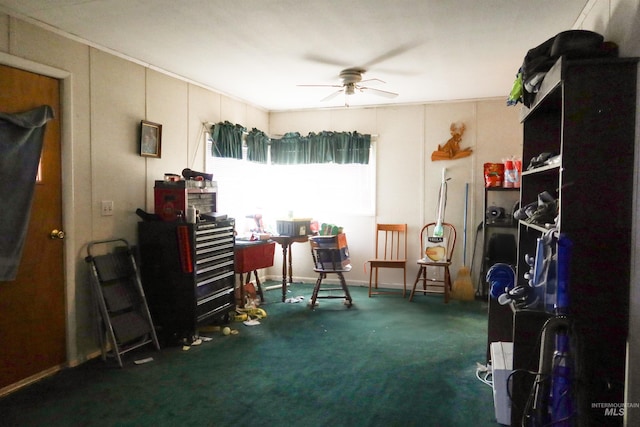 miscellaneous room with carpet floors and a ceiling fan