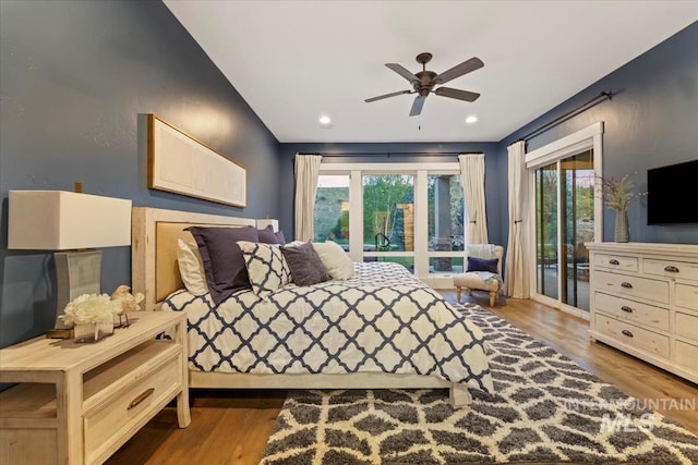 421 E Fishing Creek Ln, Eagle, ID 83616 - bedroom featuring access to outside, multiple windows, wood finished floors, a ceiling fan, and recessed lighting