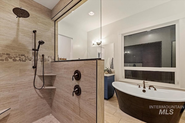 421 E Fishing Creek Ln, Eagle, ID 83616 - full bath with tiled shower, a freestanding bath, and vanity
