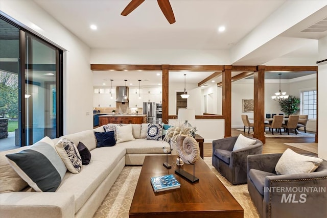 421 E Fishing Creek Ln, Eagle, ID 83616 - living room with a ceiling fan, a chandelier, light wood-style flooring, and recessed lighting