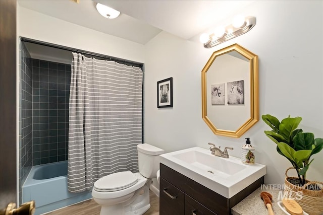 13343 N Horseshoe Bend Rd, Boise, ID 83714 - full bath featuring toilet, vanity, shower / tub combo with curtain, and wood finished floors