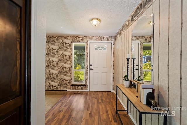 13343 N Horseshoe Bend Rd, Boise, ID 83714 - foyer entrance featuring a textured ceiling and wood finished floors