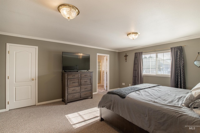 bedroom with ornamental molding, light colored carpet, connected bathroom, and baseboards