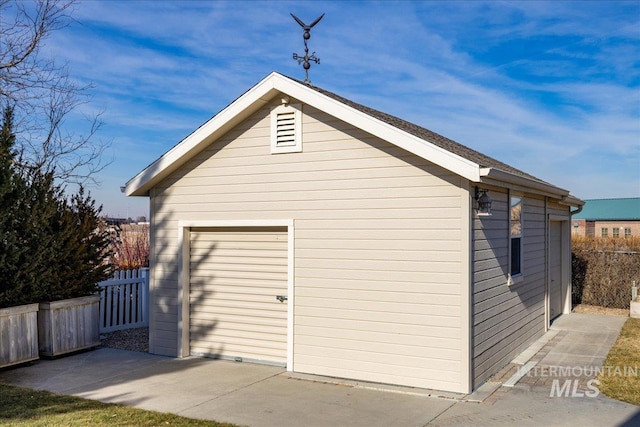 view of outdoor structure with a garage