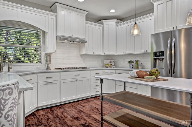 5278 N Cougar Flat Pl, Meridian, ID 83646 - kitchen with white cabinetry, appliances with stainless steel finishes, and a sink