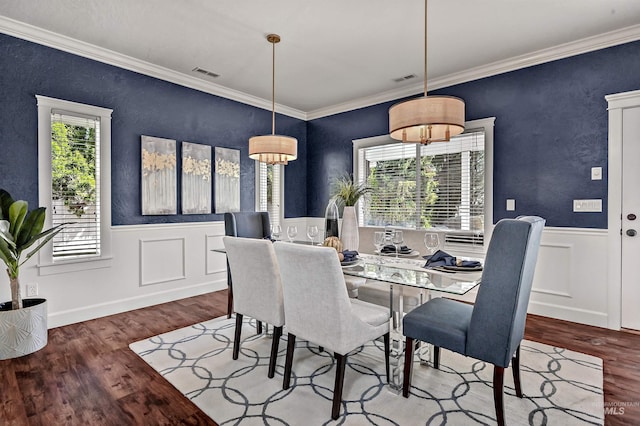 5278 N Cougar Flat Pl, Meridian, ID 83646 - dining room featuring wainscoting, crown molding, visible vents, and wood finished floors