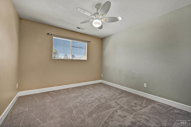 5278 N Cougar Flat Pl, Meridian, ID 83646 - spare room featuring ceiling fan, carpet flooring, baseboards, and visible vents