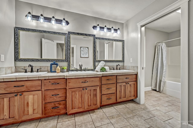 5278 N Cougar Flat Pl, Meridian, ID 83646 - bathroom with double vanity, shower / tub combo with curtain, and a sink