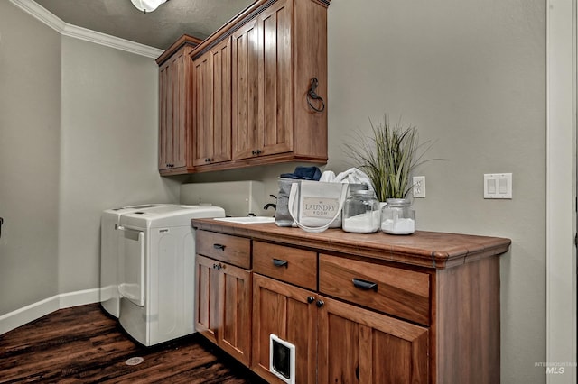 5278 N Cougar Flat Pl, Meridian, ID 83646 - washroom with baseboards, ornamental molding, washer and dryer, dark wood-type flooring, and cabinet space