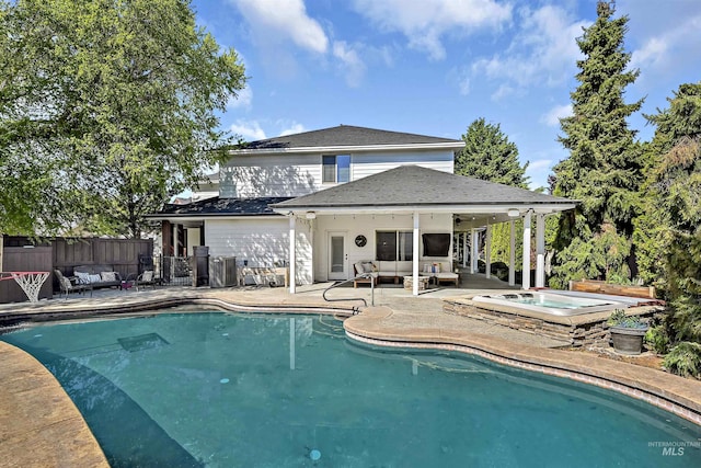 5278 N Cougar Flat Pl, Meridian, ID 83646 - view of swimming pool with a patio, fence, a jacuzzi, an outdoor hangout area, and a fenced in pool