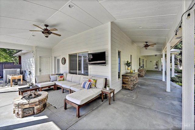 5278 N Cougar Flat Pl, Meridian, ID 83646 - view of patio / terrace with a ceiling fan and an outdoor living space with a fire pit