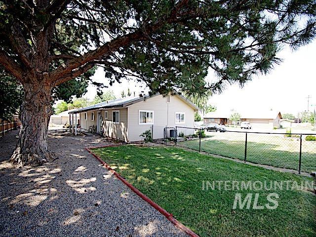 view of property exterior featuring a yard