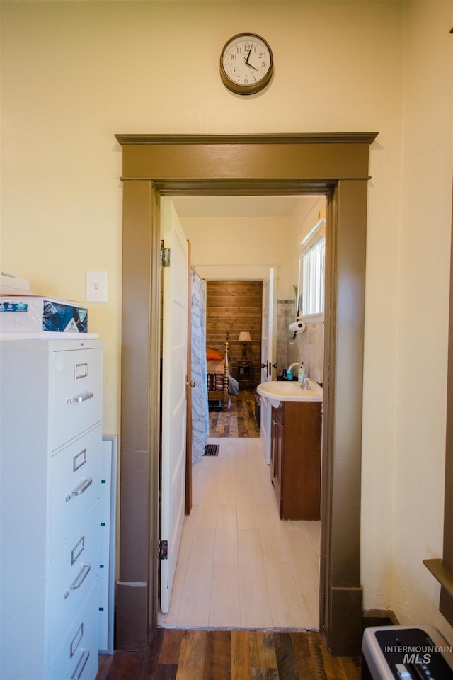 599 S Ada St, Glenns Ferry, ID 83623 - hall with wood finished floors and a sink