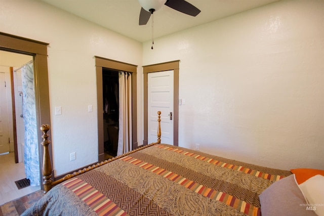599 S Ada St, Glenns Ferry, ID 83623 - bedroom with wood finished floors, a ceiling fan, and baseboards