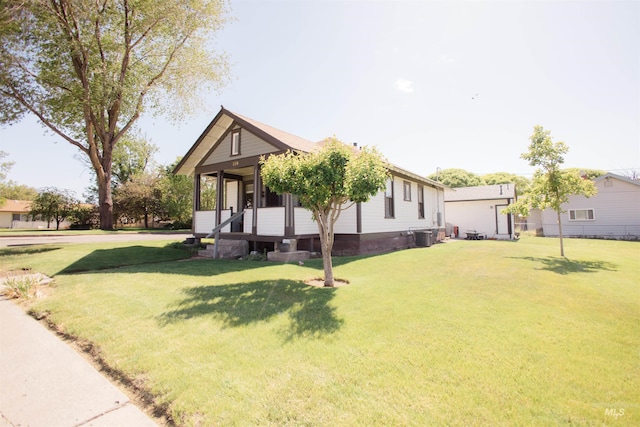 599 S Ada St, Glenns Ferry, ID 83623 - view of front of house featuring a front lawn and entry steps
