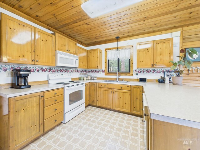 19 Hack Ln, Idaho City, ID 83631 - kitchen with white appliances, light floors, a sink, wooden ceiling, and light countertops